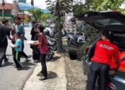 Aksi Jum’at Berkah AS Bilyard, Ratusan Kotak Makanan Dibagikan